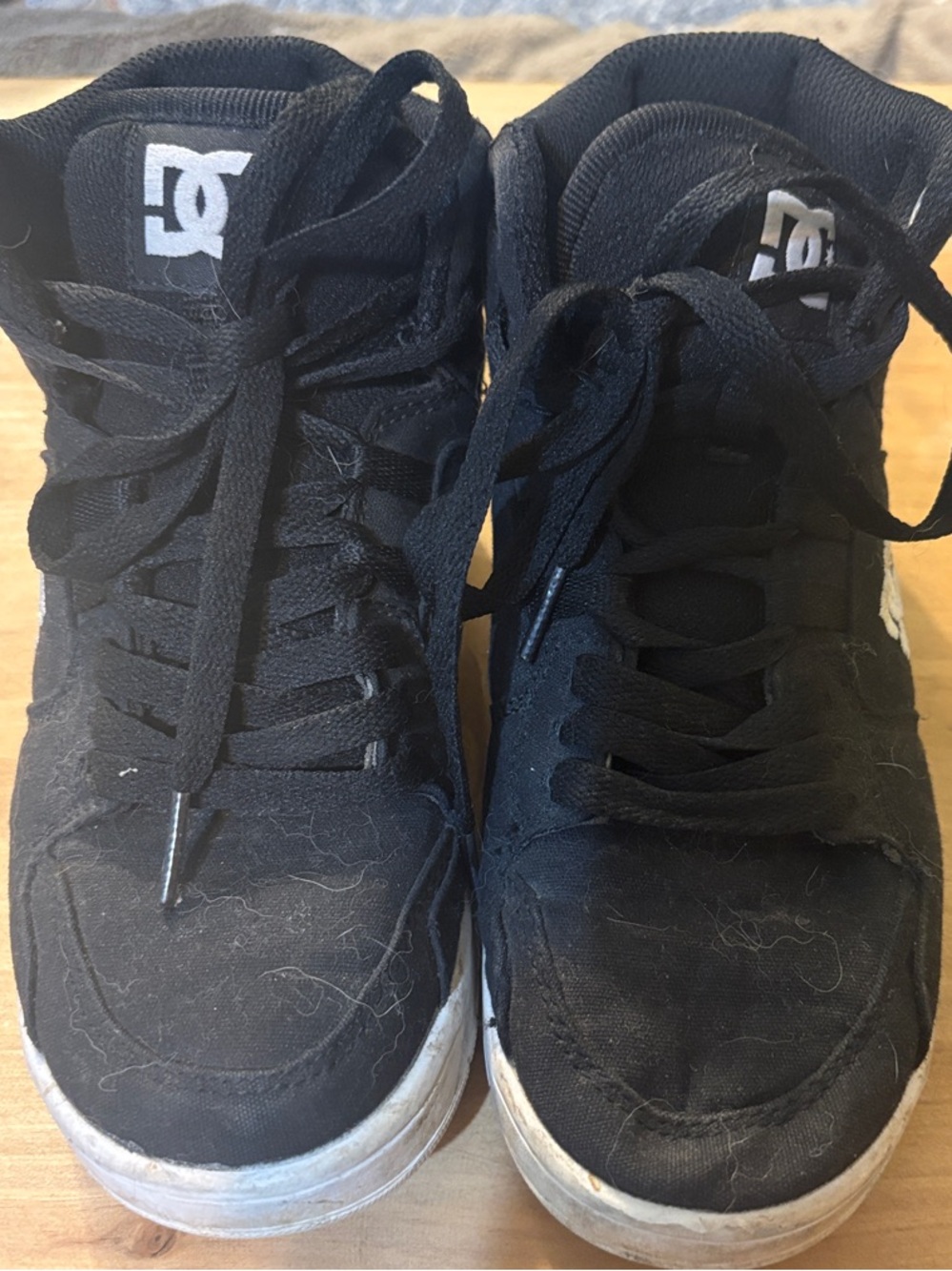 #123 DC Black and White High-Top Skate Shoes